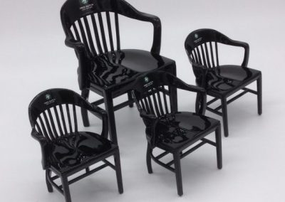 four black miniature college chairs of Fred Hutchinson CRC - one large and three small