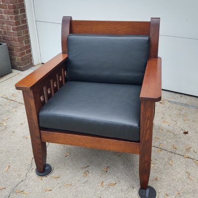 Brown Mission style chair in quarter-sawn 0ak with Black leather; college chairs