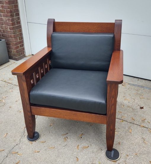 Brown Mission style chair in quarter-sawn 0ak with Black leather; college chairs