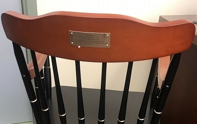 Brass Nameplate on the rear of chair