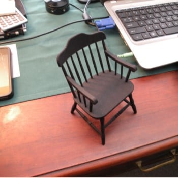 single mininature chair on best as a donor award