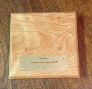 wooden base for miniature college chair as retirement gift for employee