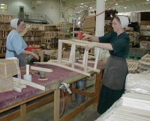 Two Amish women building one of the best college chairs