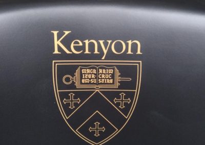 Kenyon College Chair with Gold Logo on the black chair