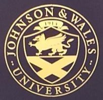 Gold Seal of Johnson & Wales University on black college chair