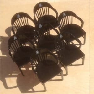 Seven black University of Arizona miniature college chairs on maple